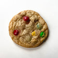 Cookie with M&Ms on a white background